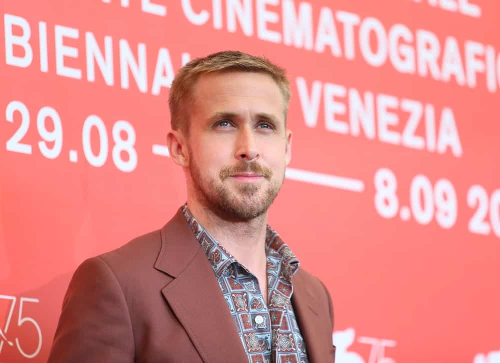 Actor Ryan Gosling’s gorgeous Caesar fade hairstyle is a perfect pair for his tan suit when he attended the ‘First Man’ photocall during the 75th Venice Film Festival at Sala Casino on August 29, 2018 in Venice, Italy.