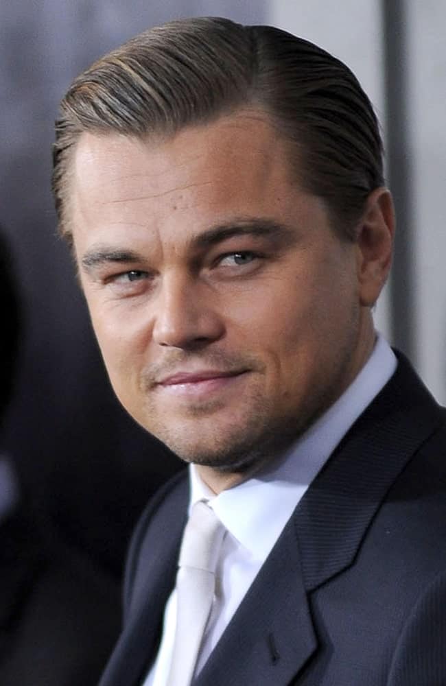 Photo of Leonardo Dicaprio at Shutter Island premier. He has a slicked back hairstyle.