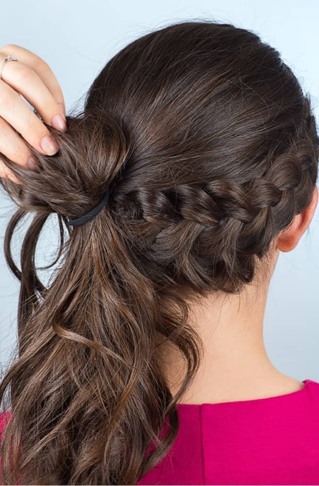 Step 6: Make a looped ponytail with the crown of your hair