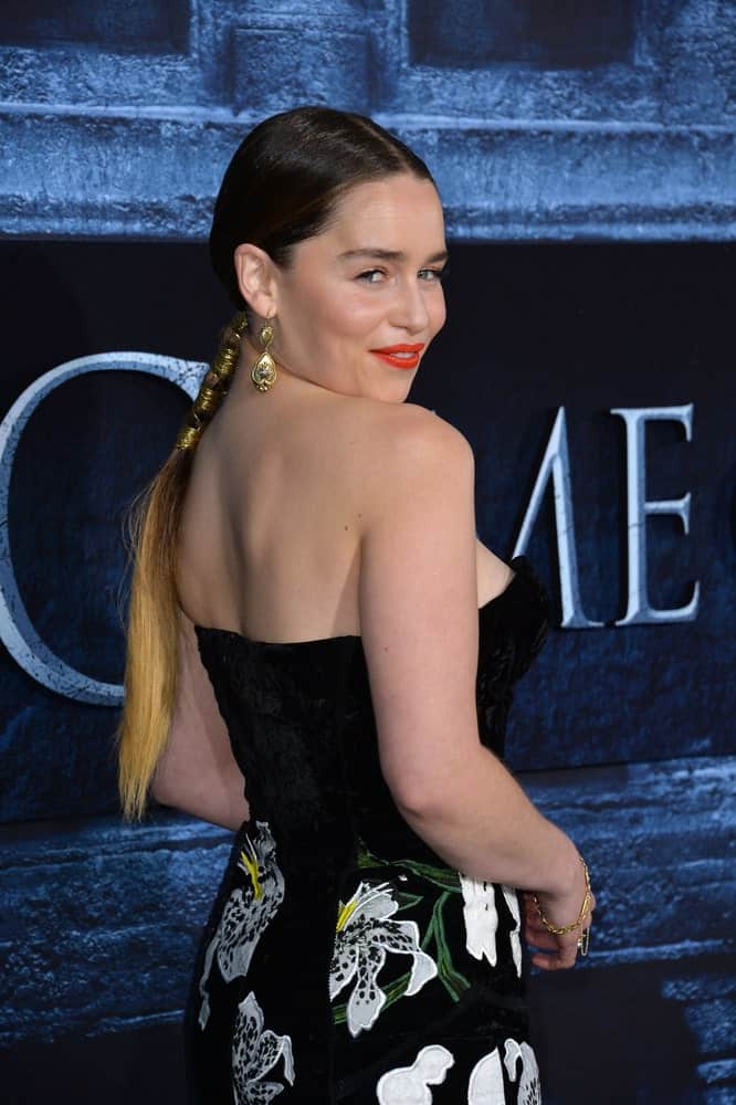 Emilia Clarke poses her side profile at the season 6 premiere of Game of Thrones 2016.