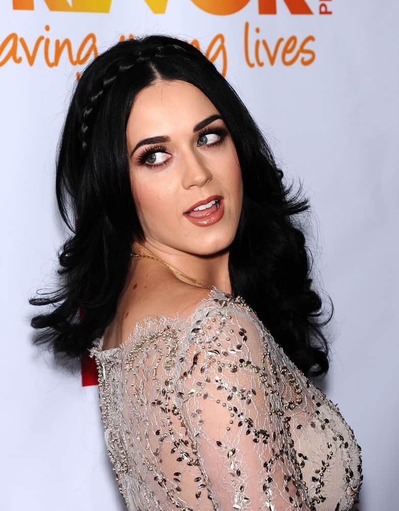 Katy Perry showcased a fab look featuring her long wavy hair incorporated with a braid. This look was worn at the Trevor Project Honors Katy Perry on December 2, 2012.