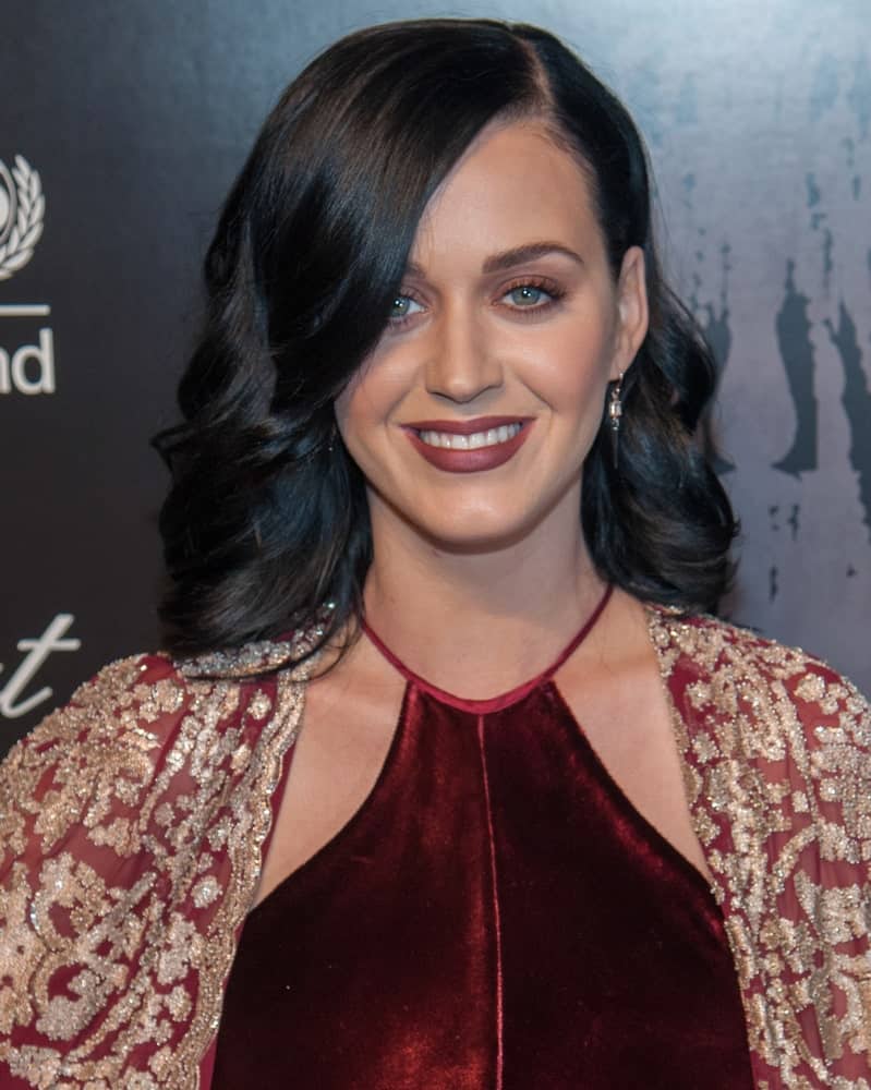 The singer had side-parted black waves to pair with her red halter gown at the 9th Annual UNICEF Snowflake Ball at Cipriani Wall Street on December 3, 2013.