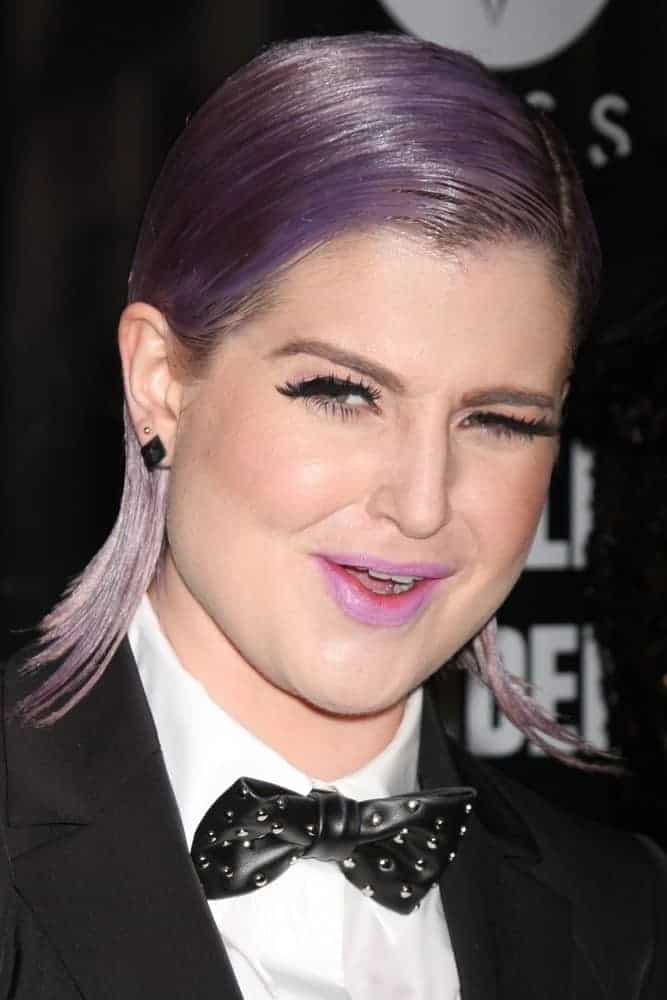 Kelly Osbourne stole so many eyes at the “RuPaul’s Drag Race” Season 6 Premiere Party at Hollywood Roosevelt Hotel with her black suit outfit and purple hair. Photo taken on February 17, 2014.