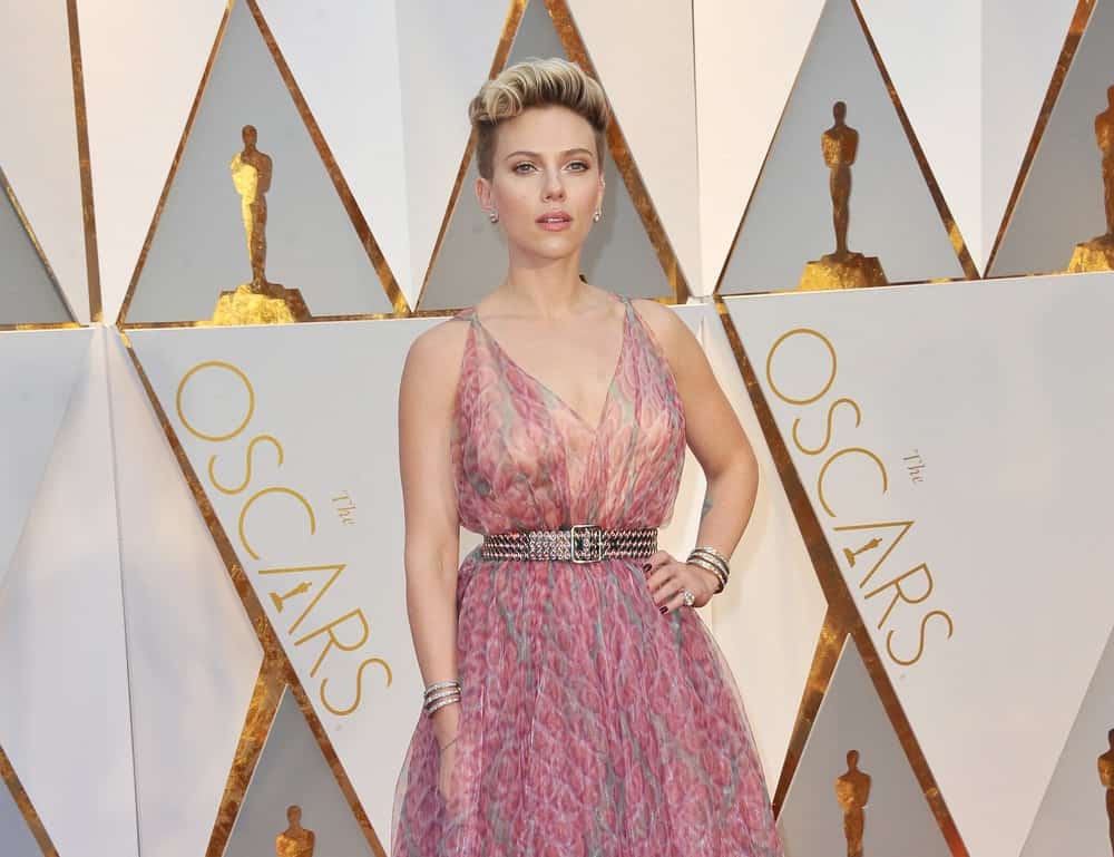 Scarlett Johansson was at the 89th Annual Academy Awards held at the Hollywood and Highland Center in Hollywood on February 26, 2017. She looked absolutely stunning in her floral pink sheer dress and her tousled upstyle with a slight pompadour look.