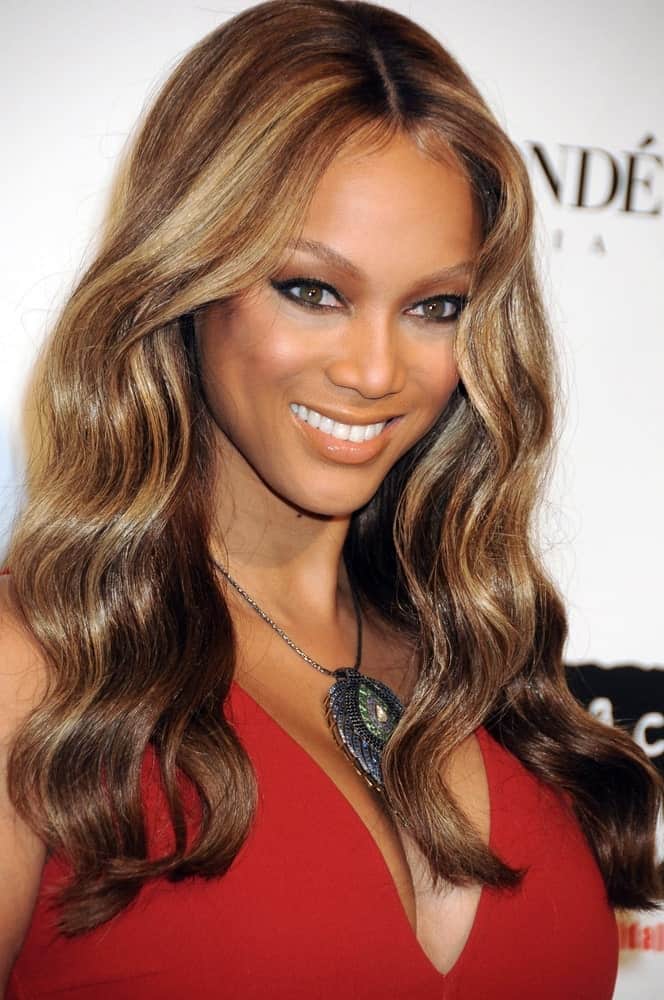 Tyra Banks attended the Keep A Child Alive 5th Annual Black Ball Benefit, Hammerstein Ballroom in New York on November 13, 2008. She wore a beautiful red dress and her hair was a wavy highlighted masterpiece.