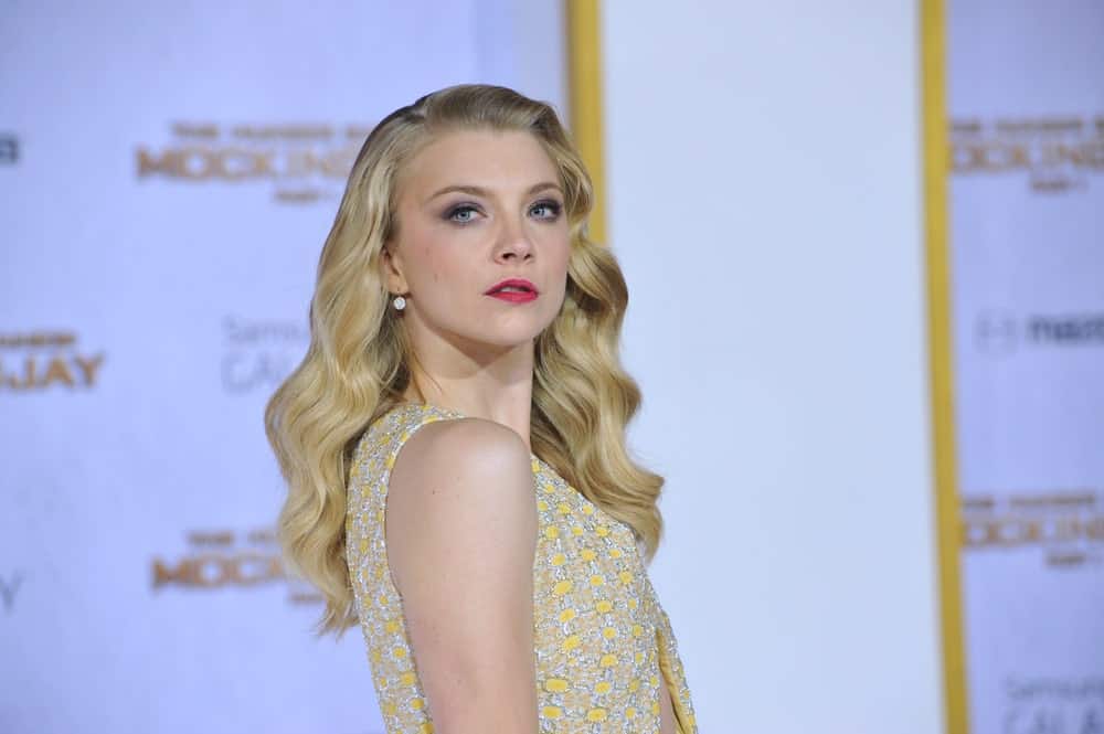 Natalie Dormer with her flowing blonde waves at the Los Angeles premiere of her movie “The Hunger Games: Mockingjay Part One” held on November 17, 2014.