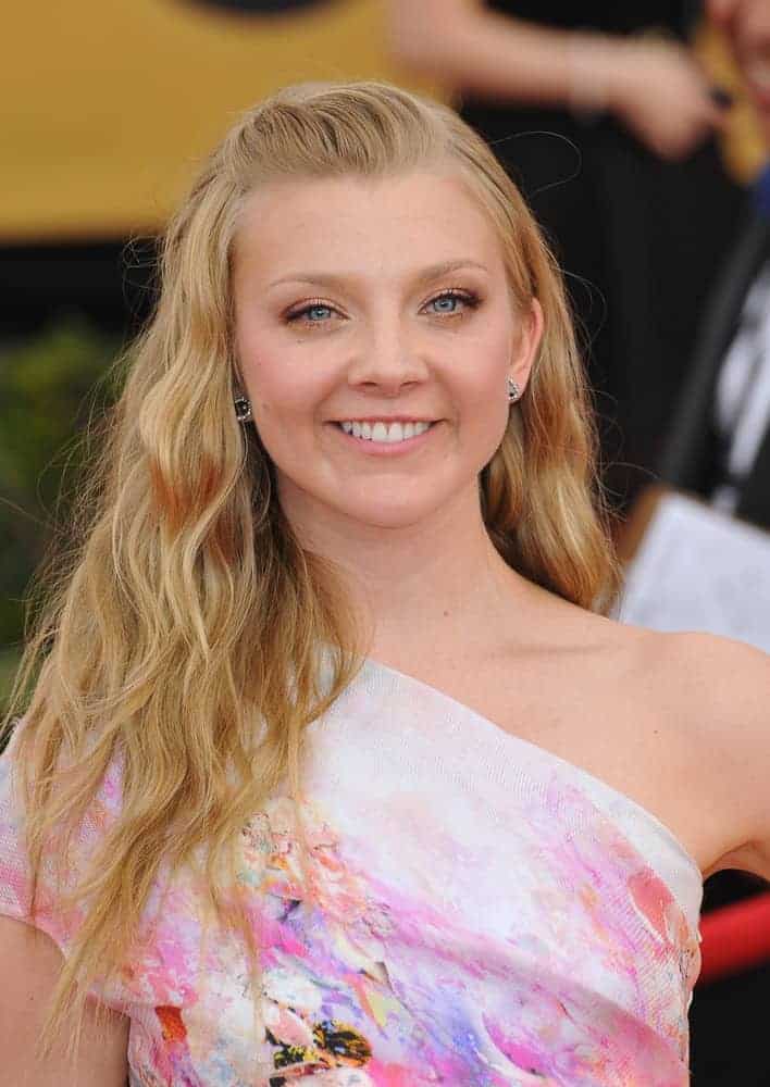 Natalie Dormer looked ethereal wearing this tousled wavy hairstyle with pinned up bangs at the 2015 Screen Actors Guild Awards on January 25, 2015.