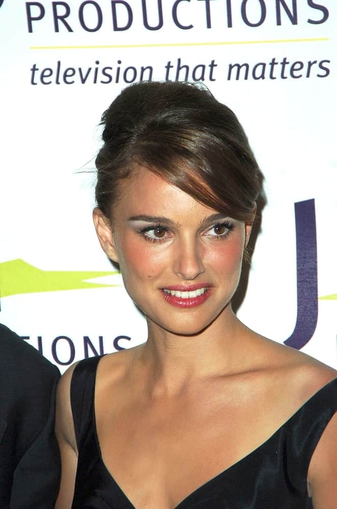 Natalie Portman went with a vintage look to her black dress and upstyle with long side-swept bangs at the 2007 Vision Awards from JTN Productions at the Beverly Hills Hotel in New York, NY on October 08, 2007.