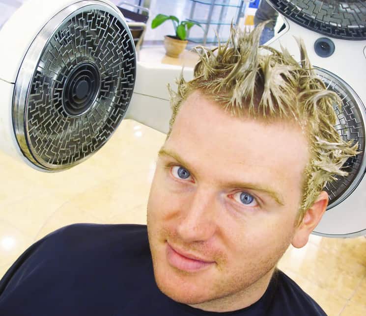 Man getting highlights in hair