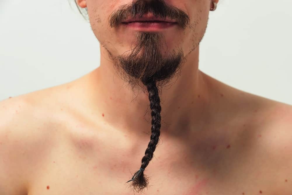 Man with long braided beard.
