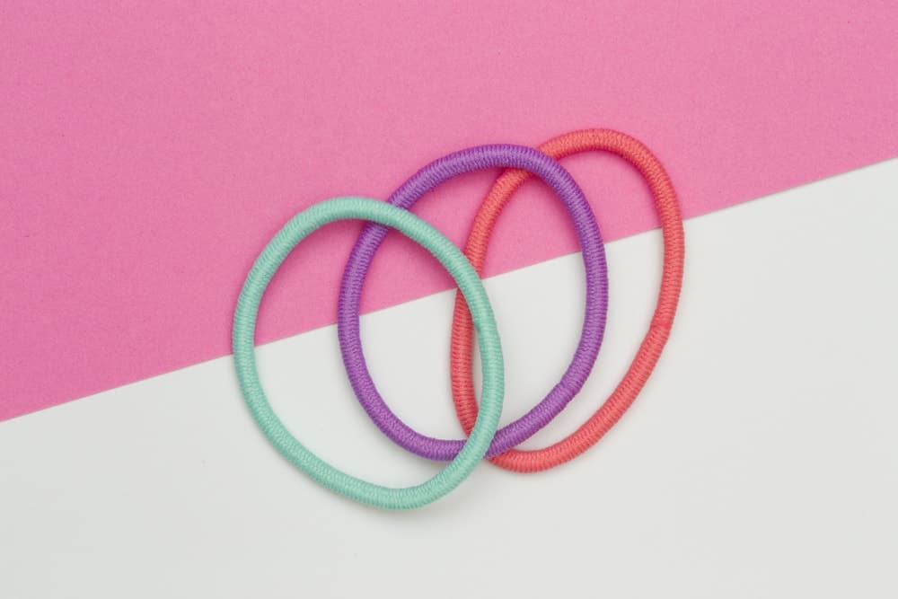 A set of colorful elastic hair ties.