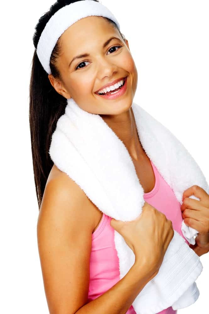 A woman wearing a white sweatband.