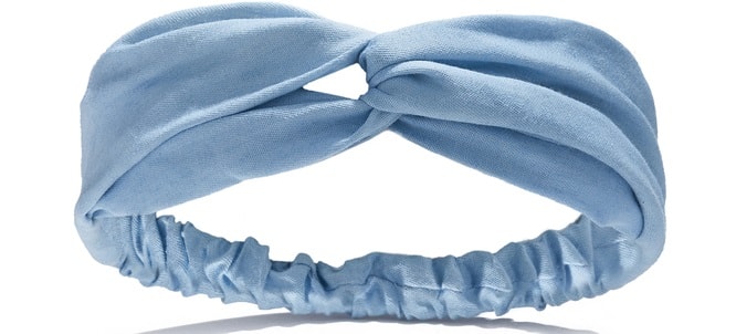 A close look at a blue fabric headband.