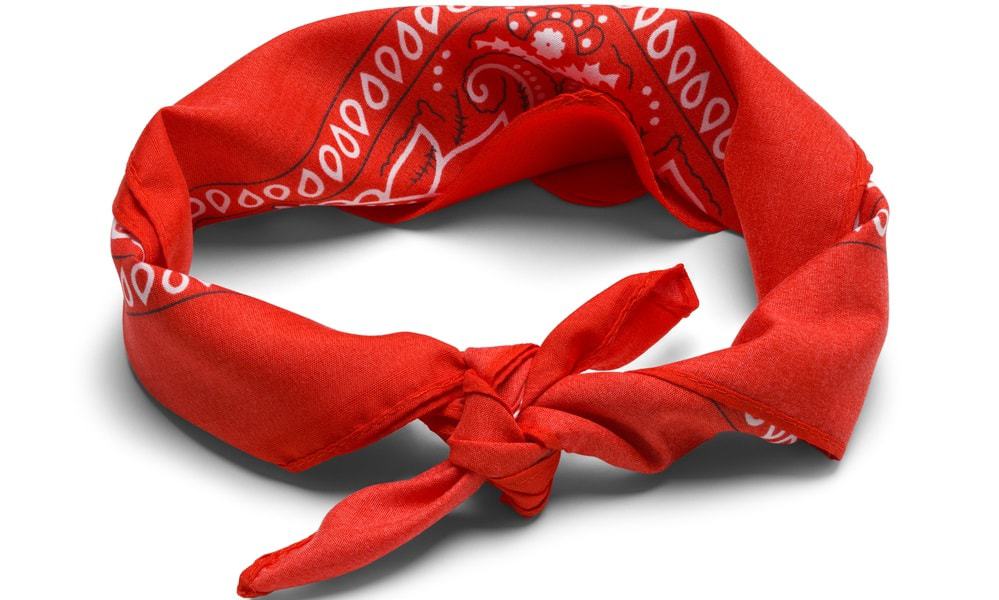 A close look at a red scarf headband.