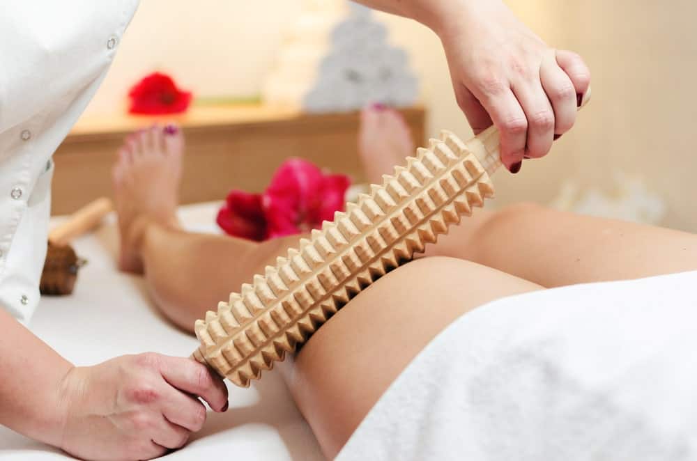A close look at a woman having an anti-cellulite massage.