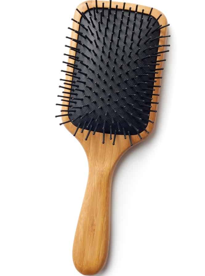 A bamboo paddle hair brush.